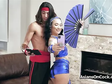 Kitana gags on a big cock